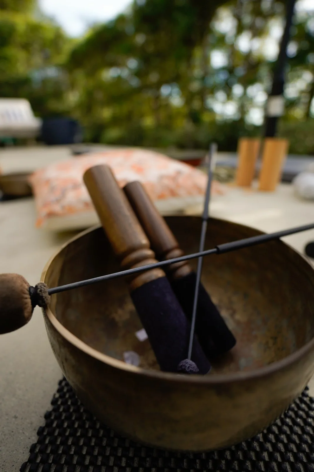 Close detail of Om Floating sound instruments